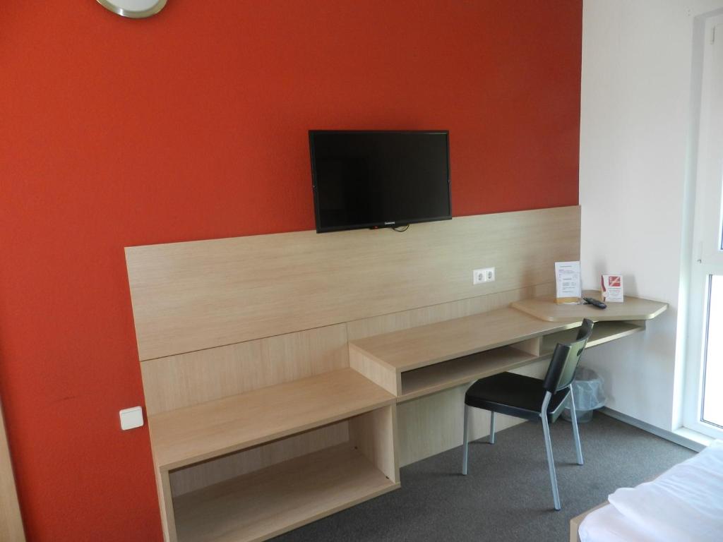 TV a/nebo společenská místnost v ubytování Motel Angern