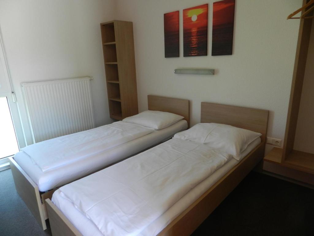 Postel nebo postele na pokoji v ubytování Motel Angern