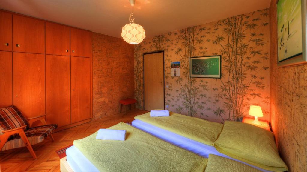 Uma cama ou camas num quarto em Guesthouse Marko