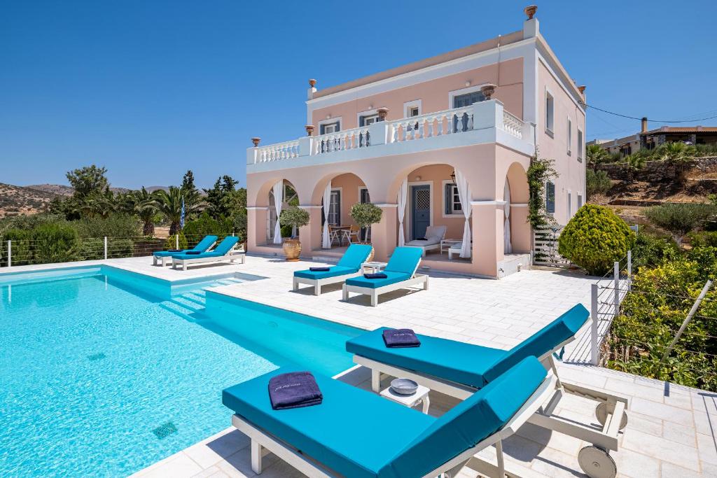 an image of a villa with a swimming pool at Villa Casa Del Sol Syros in Parakopí