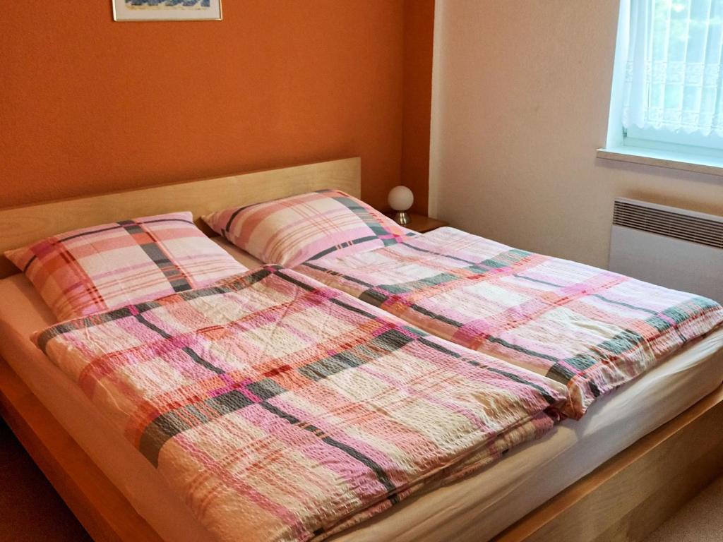Postel nebo postele na pokoji v ubytování Ferienwohnung Elfi