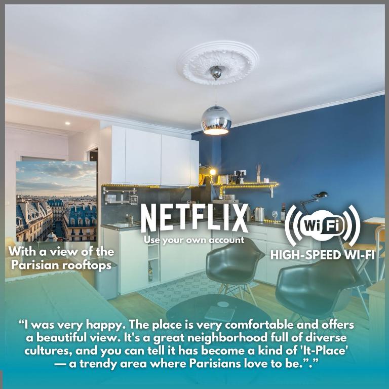 une cuisine avec vue sur le parlement rotoscopée dans l'établissement Cozy 1 Bedroom in Central Paris & Rooftop Views, à Paris