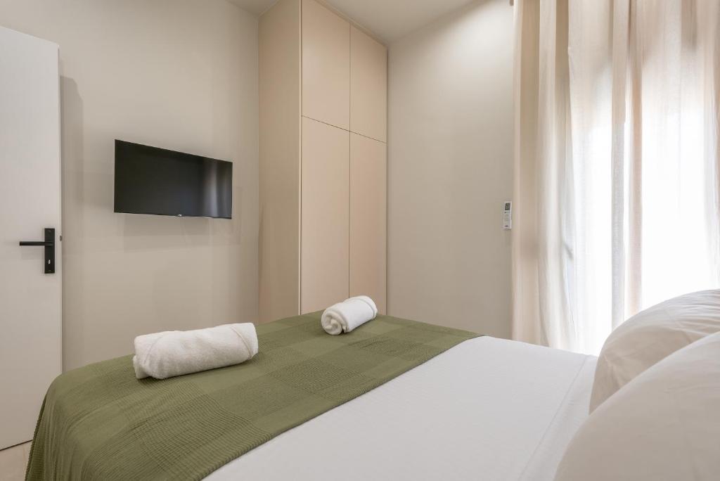 En eller flere senge i et værelse på Brisa Marina Limnos