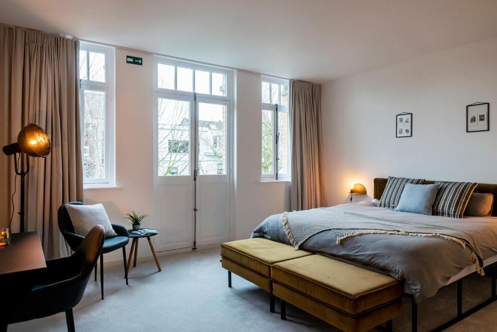 Postel nebo postele na pokoji v ubytování B&B Achilles