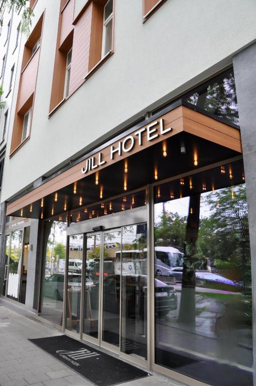 a building with a hotel sign on the front of it at Jill Hotel Brussels in Brussels