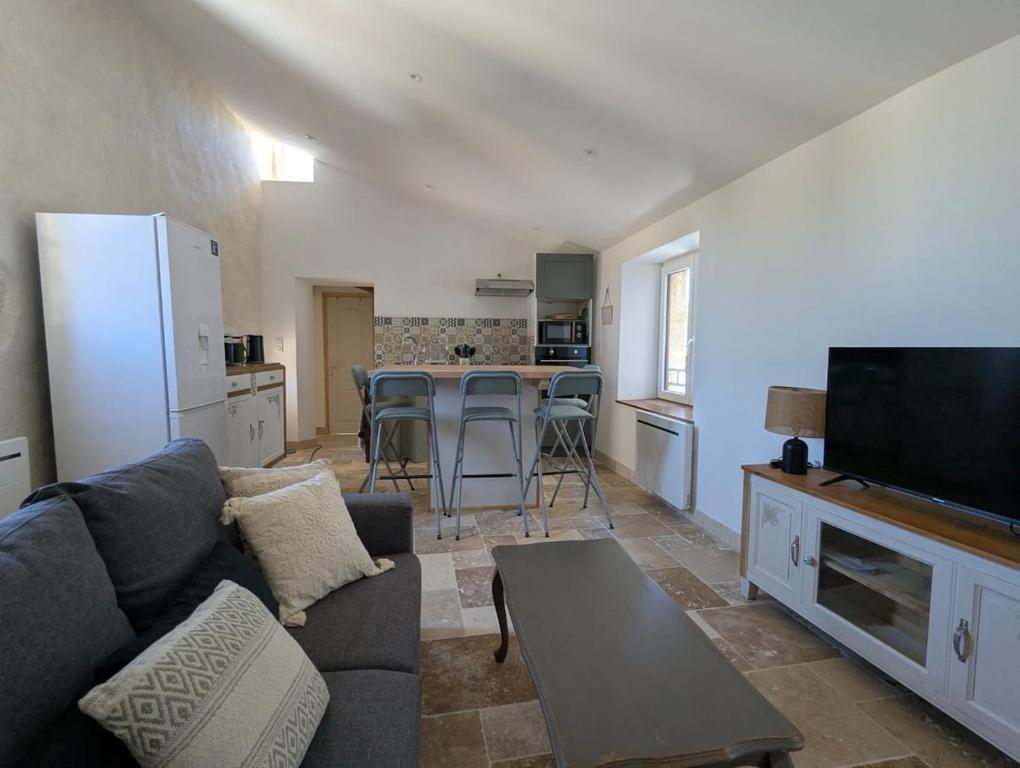 Køkken eller tekøkken på Entre cuves et sources - au coeur de Goudargues