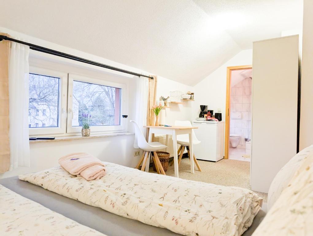 Postel nebo postele na pokoji v ubytování L7 - Urlaubsmagie - Kleine Wohnung am Wanderweg