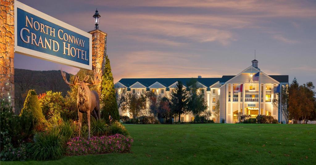 a sign in front of a grand hotel at North Conway Grand Hotel in North Conway