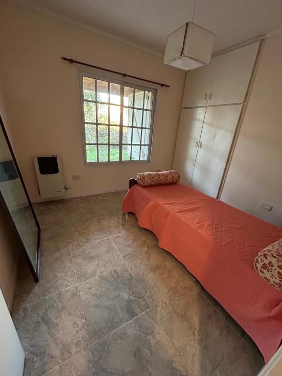 Ένα ή περισσότερα κρεβάτια σε δωμάτιο στο Casa Quinta La Carmina