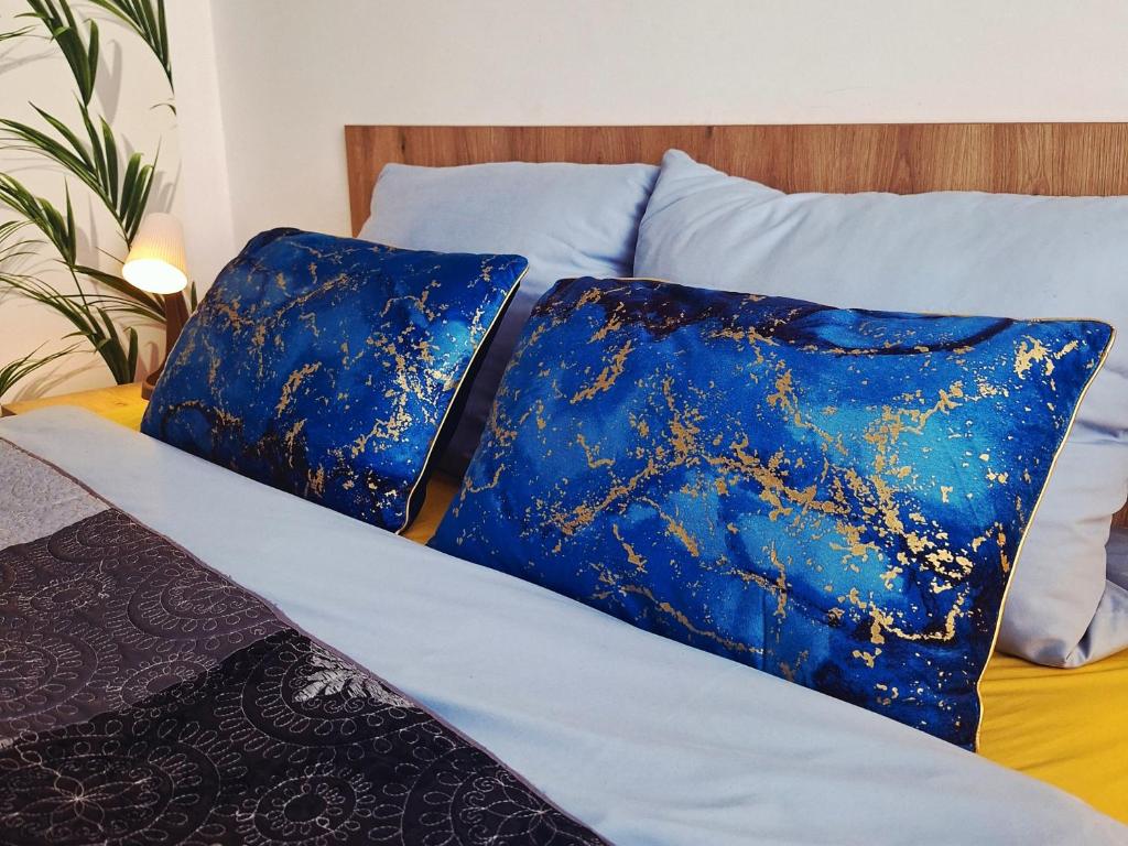 Postel nebo postele na pokoji v ubytování Apartament Blue Polana Szaflarska