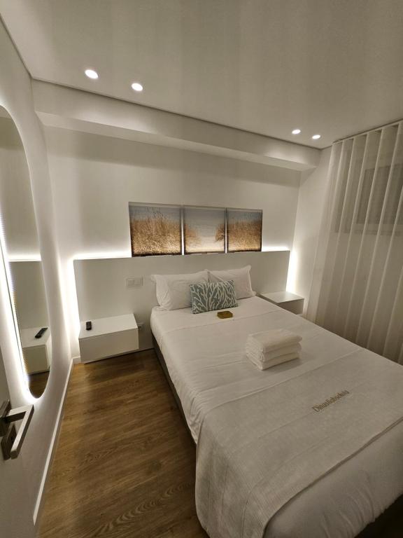 Postel nebo postele na pokoji v ubytování Santiago Afife Beach