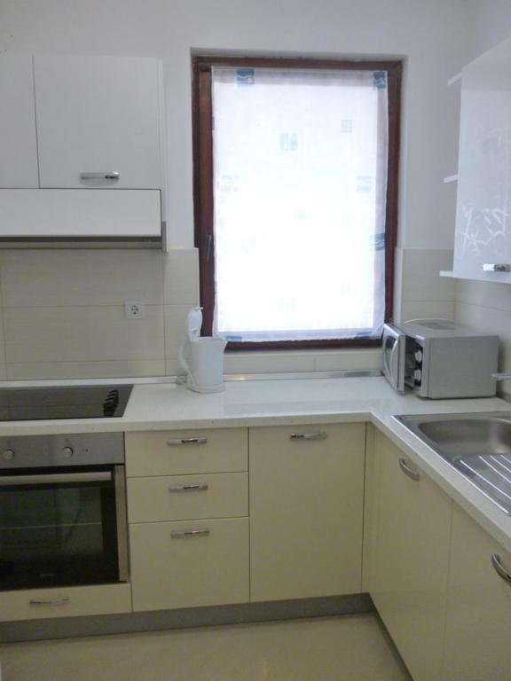 Kuchnia lub aneks kuchenny w obiekcie Apartments Spada
