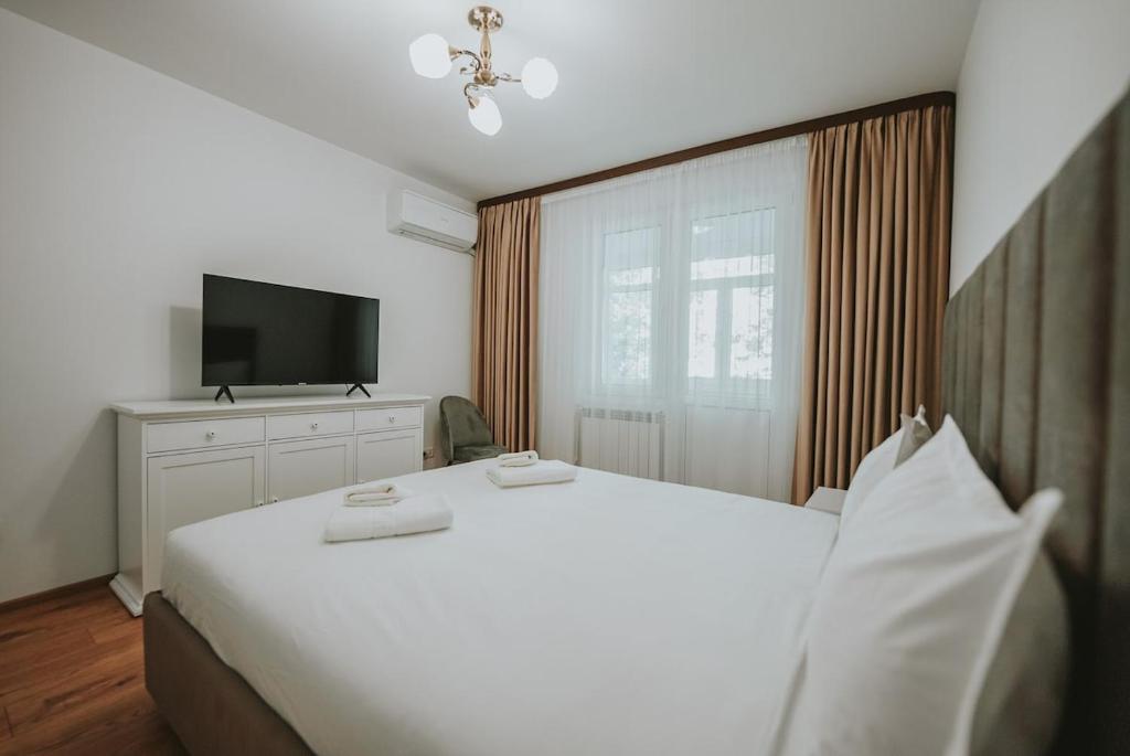 Katil atau katil-katil dalam bilik di Luxury Apartment of Suceava