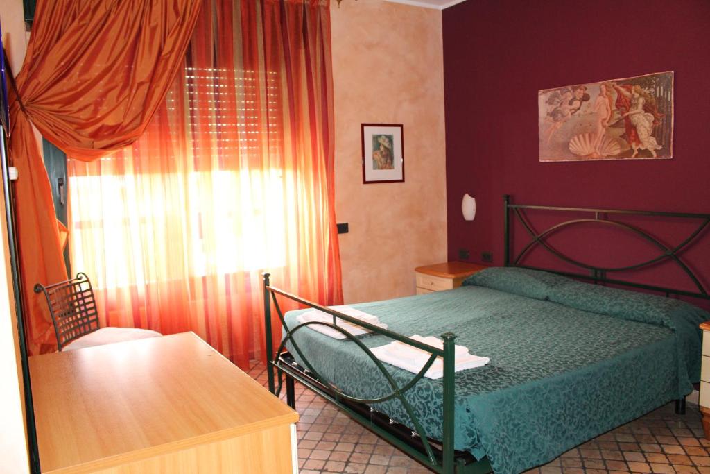 Кровать или кровати в номере Da Mariuccia