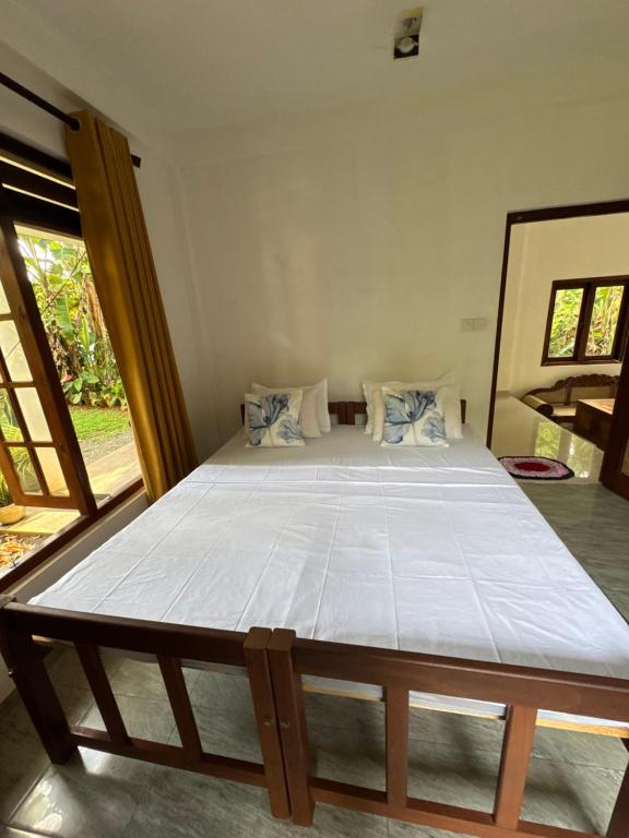 Ένα ή περισσότερα κρεβάτια σε δωμάτιο στο Villa Thasha