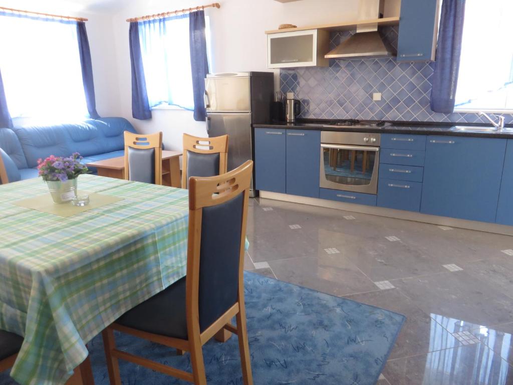 Kuchyňa alebo kuchynka v ubytovaní Gardenia Apartments