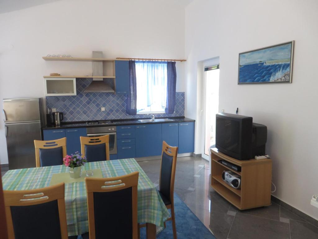 Kuchyňa alebo kuchynka v ubytovaní Gardenia Apartments