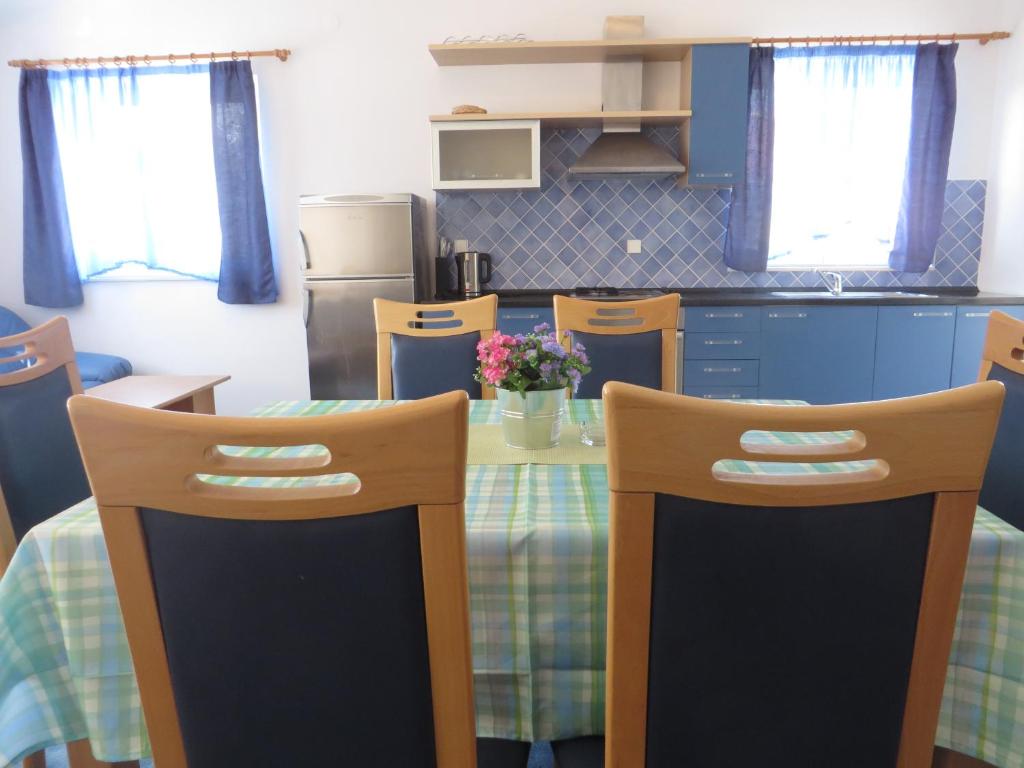 Kuchyňa alebo kuchynka v ubytovaní Gardenia Apartments