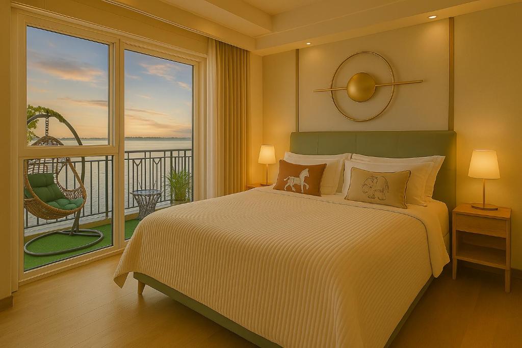 a bedroom with a large bed and a balcony at Luxury Suites near Okada, Solaire, City of Dreams in Manila