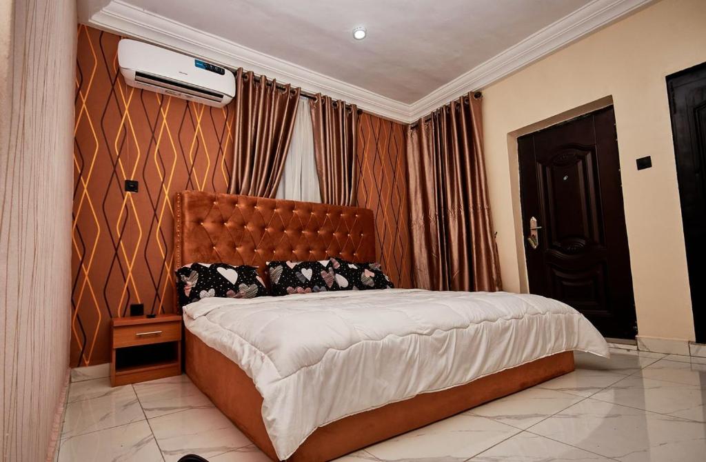 Postel nebo postele na pokoji v ubytování Prestige Haven