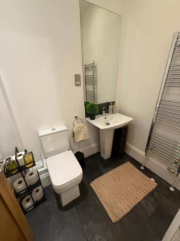 Koupelna v ubytování Cosy apartment with beach view