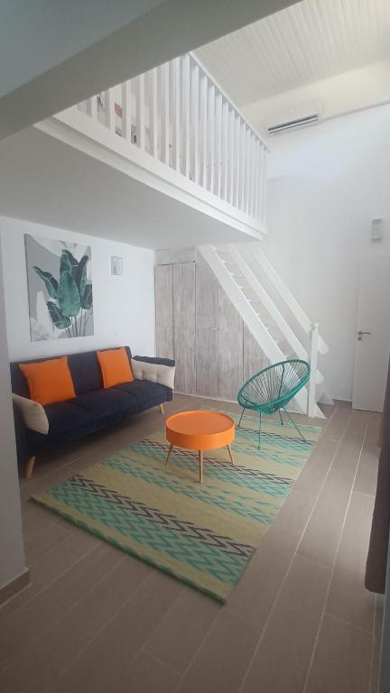 Posezení v ubytování Lumineux Duplex SANDÌA