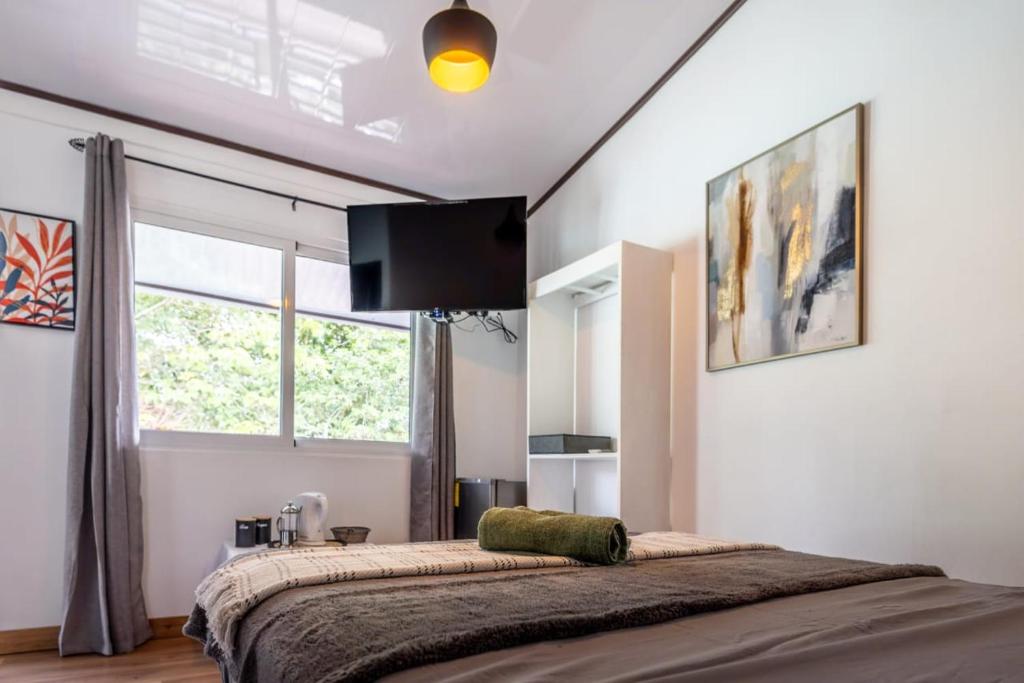 Postel nebo postele na pokoji v ubytování BUDDA HOME