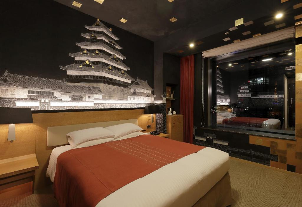 Postel nebo postele na pokoji v ubytování Park Hotel Tokyo