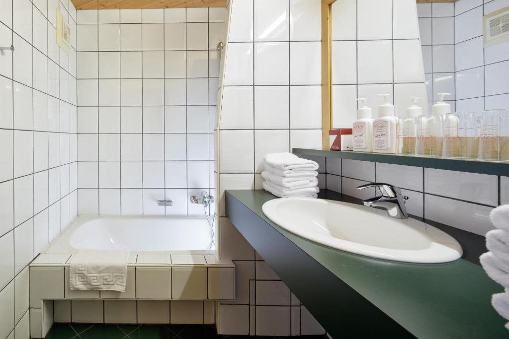 Koupelna v ubytování Sporthotel Kogler