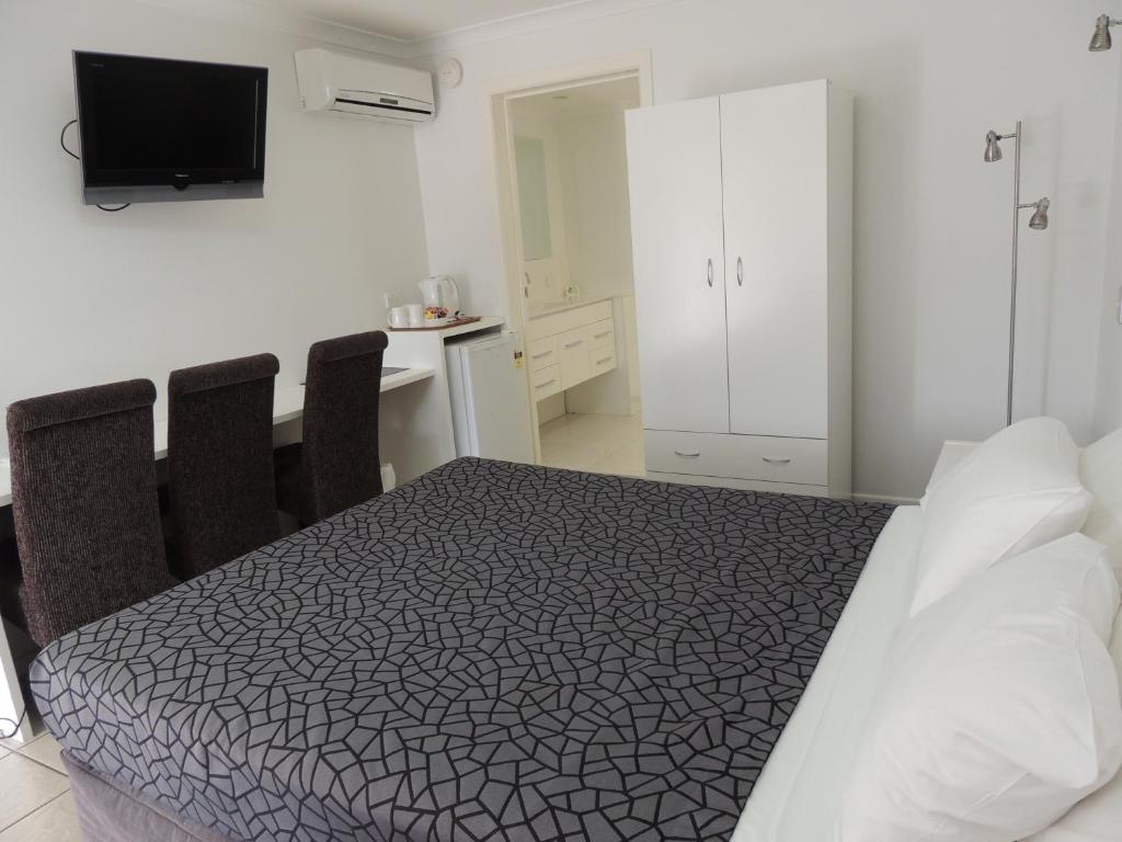 Postel nebo postele na pokoji v ubytování Park View Motel