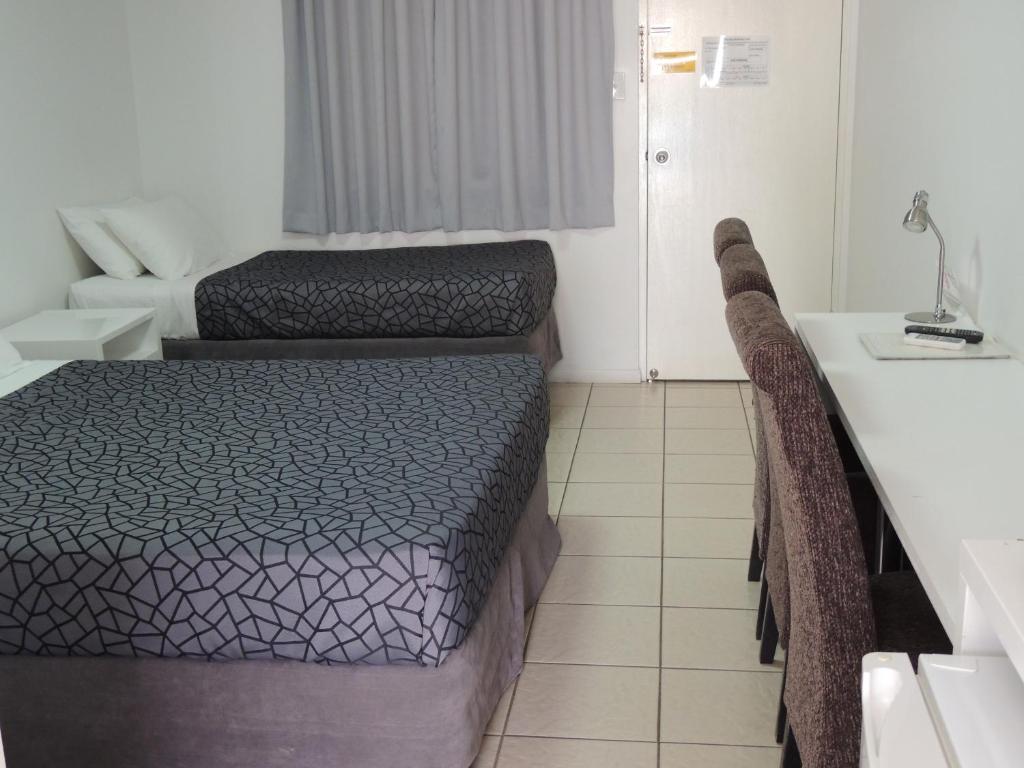 Postel nebo postele na pokoji v ubytování Park View Motel