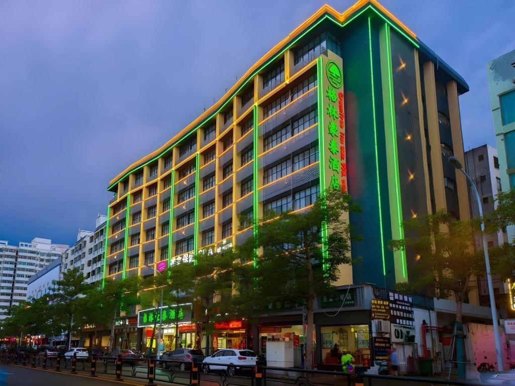 a large building on a city street with at GreenTree Inn Haikou City Wuzhishan Road in Haikou