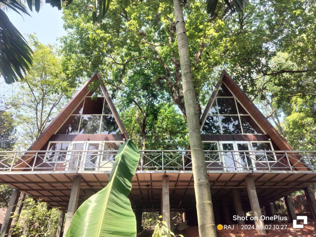 Κήπος έξω από το Tanshikar Spice Farm Cottages