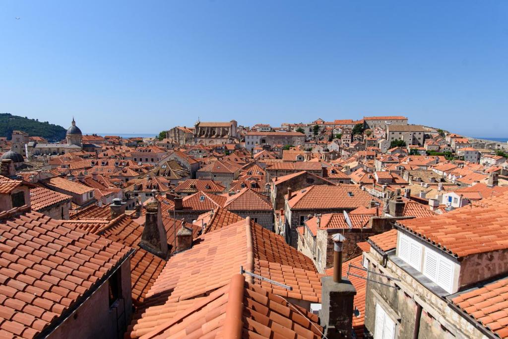 an aerial view of a city with red roofs at KALETA HOUSE by DuHomes in Dubrovnik
