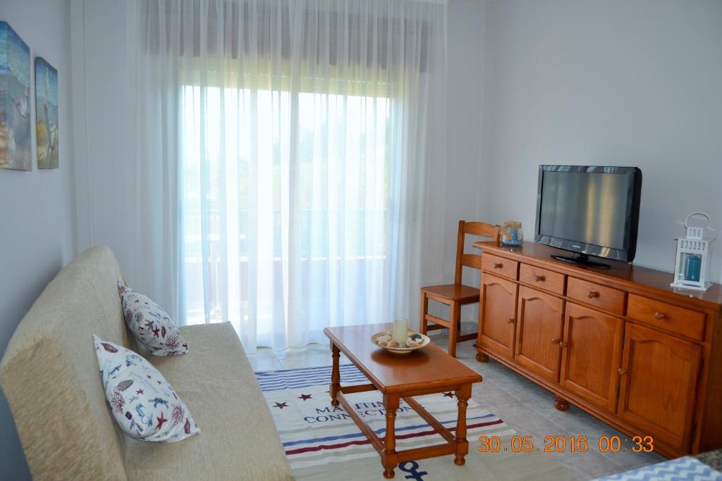 Telewizja i/lub zestaw kina domowego w obiekcie Apartamentos Montalvo Playa