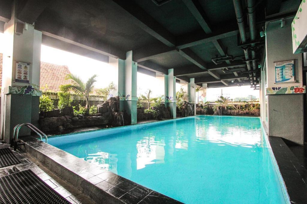 Πισίνα στο ή κοντά στο Grand Darmo Suite by AMITHYA