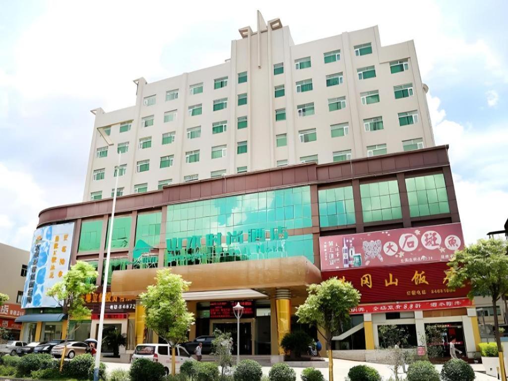 a large white building with a lot of windows at Shanshui Trends Hotel Shenzhen Southern City in Tiantangwei