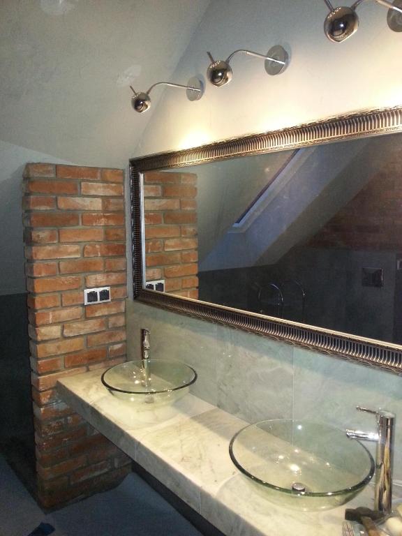 Kúpeľňa v ubytovaní Cudodomek SPA w Mrozach Wielkich koło Ełku