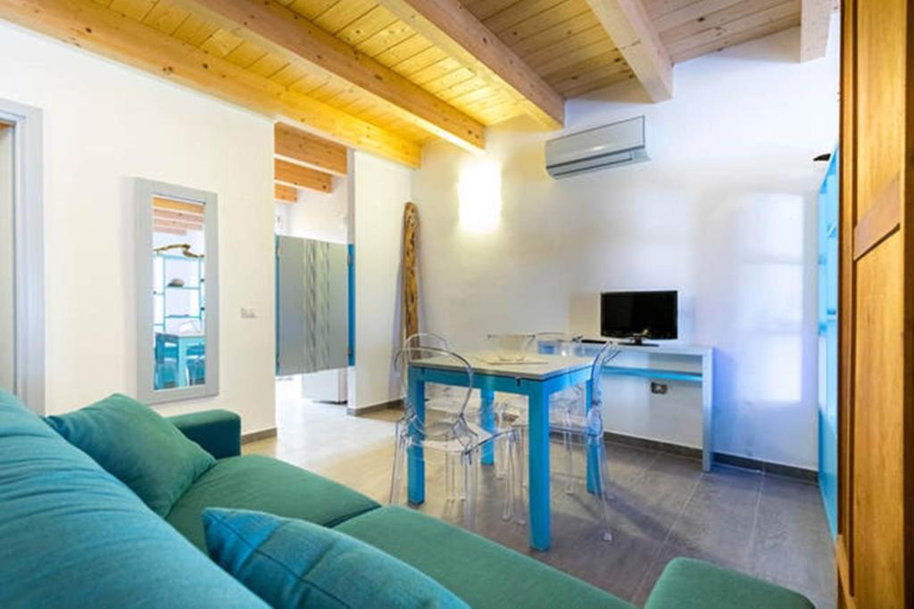 TV a/nebo společenská místnost v ubytování Residenza Cuntin