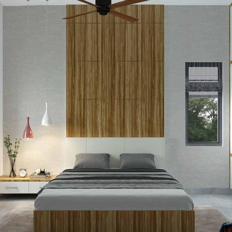 a bedroom with a large bed with a wooden headboard at Bali Guesthouse in Uluwatu