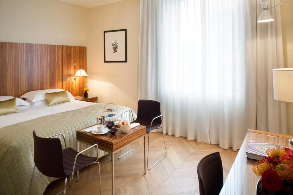 Postel nebo postele na pokoji v ubytování Starhotels Anderson