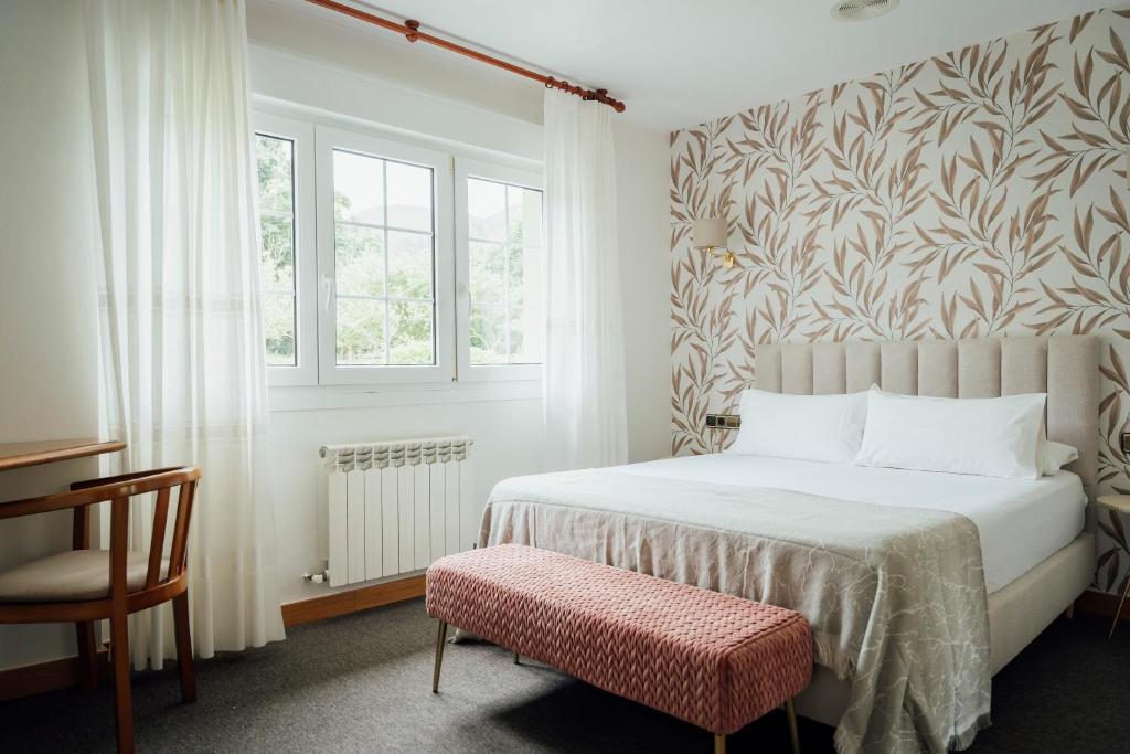Postel nebo postele na pokoji v ubytování Hotel San Jorge