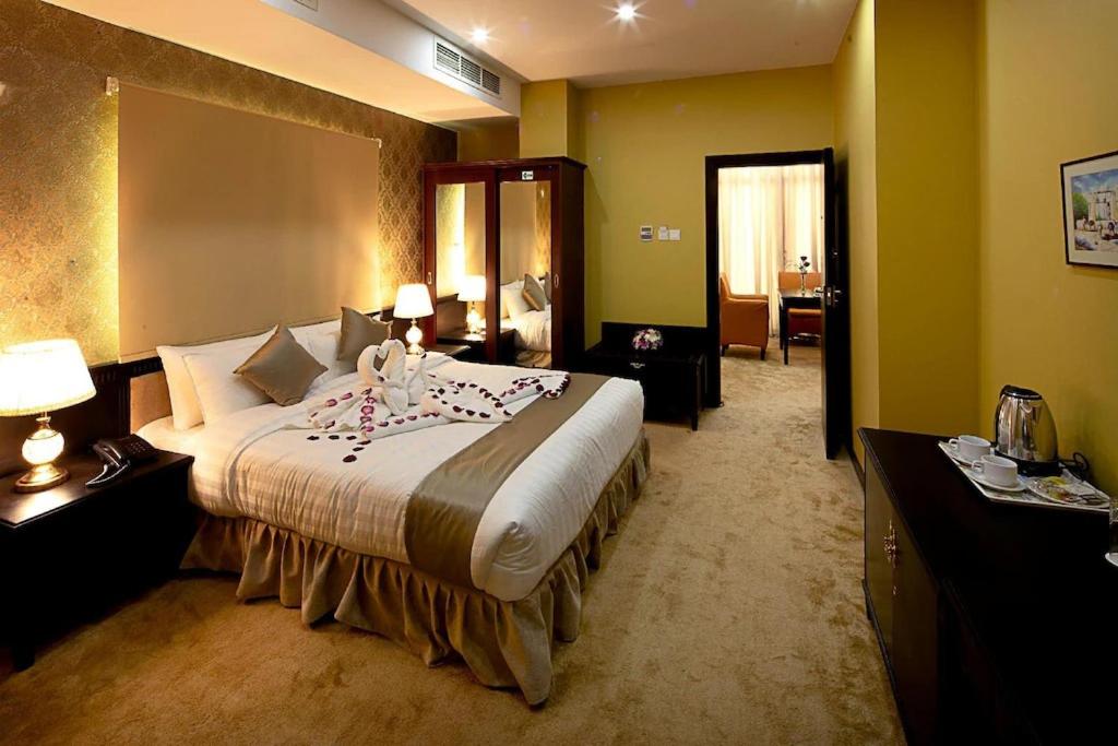 Ένα ή περισσότερα κρεβάτια σε δωμάτιο στο City Point Hotel