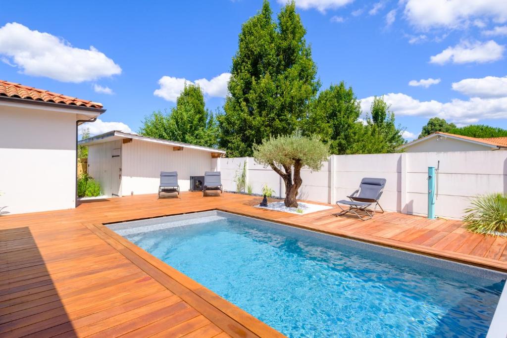 Πισίνα στο ή κοντά στο Villa l'Escapade Landaise