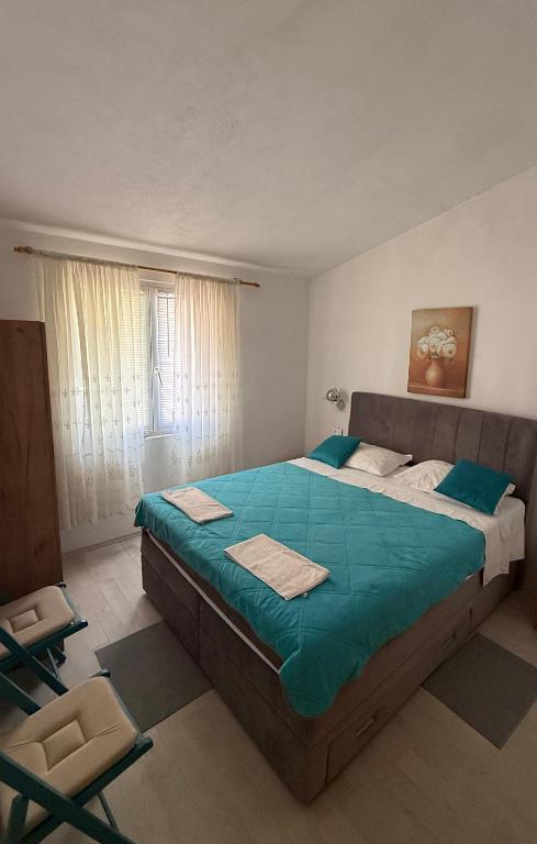 Postel nebo postele na pokoji v ubytování Apartments Jerković Drašnice-1bd