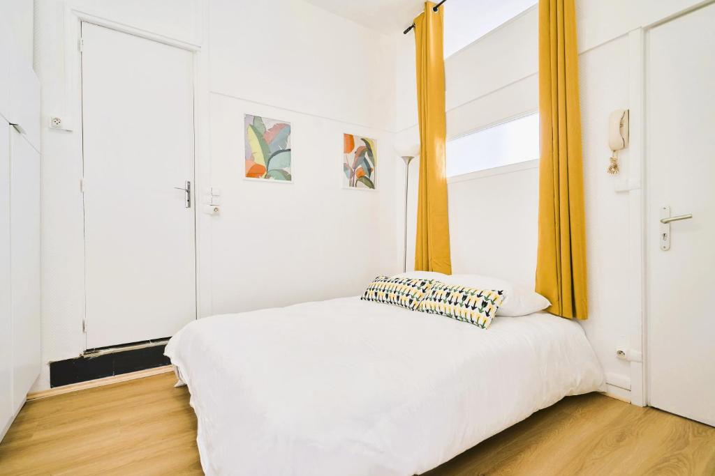 En eller flere senge i et værelse på Studio central Lille à pied ou métro