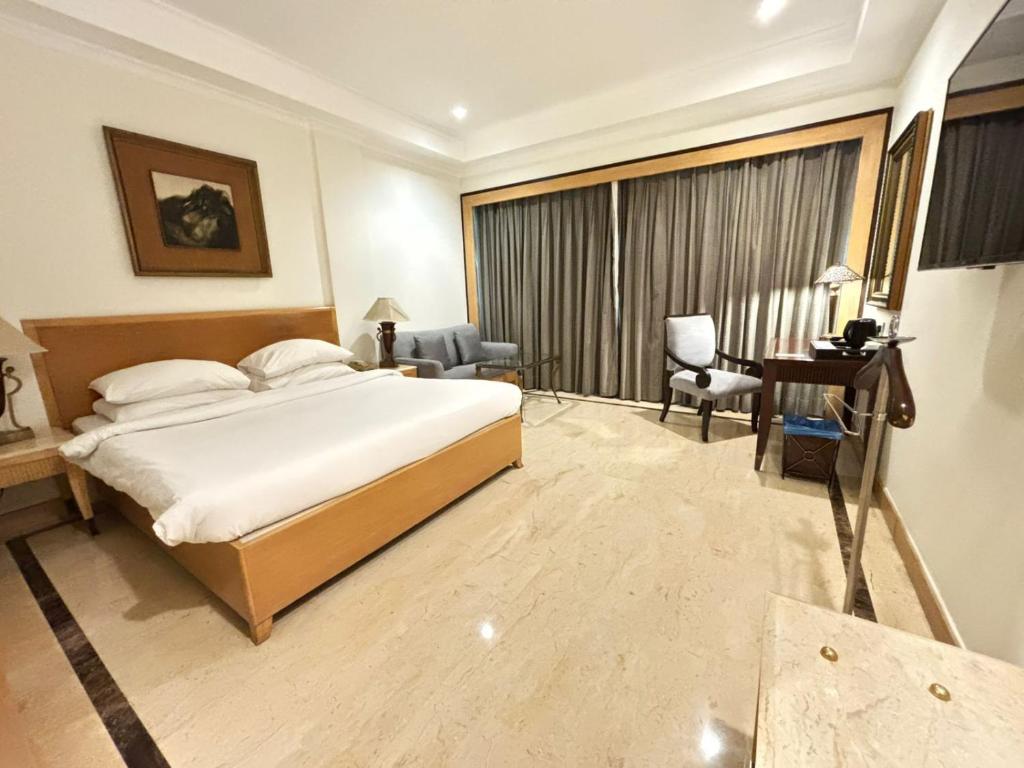 فضای داخلی Hotel The Hans - Connaught Place, New Delhi در دهلی نو - تصویر ۳