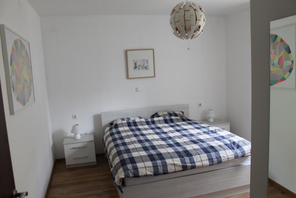 Posteľ alebo postele v izbe v ubytovaní Apartments Dina