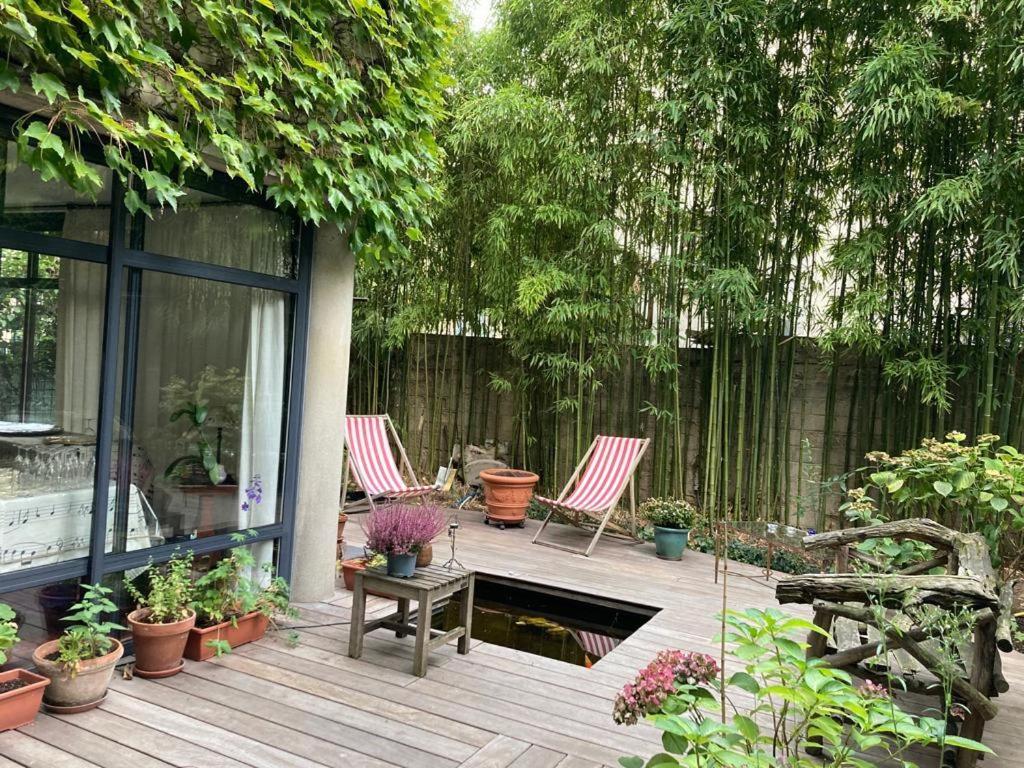 Κήπος έξω από το Garden Studio Les Bambous