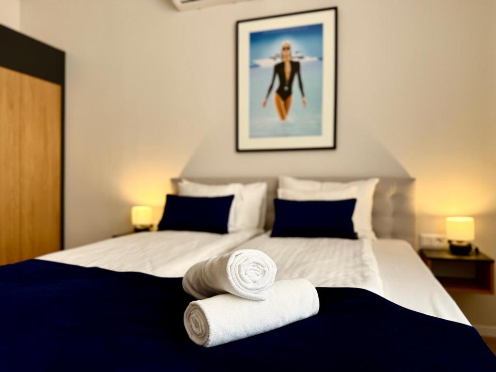 Ένα ή περισσότερα κρεβάτια σε δωμάτιο στο President Bestern